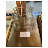 Metal milk bottle rack with bottle