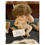Ceramic dress up baby doll