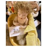 Ceramic baby in a bath
