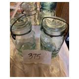 Blue glass Atlas jars with lids