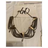 Silver and gold colored necklace