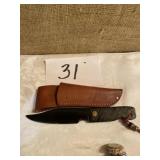 Stone knife with sheath