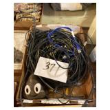 Assorted electrical wires and Bluetooth speaker