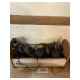 Wooden toolbox with screwdrivers, batteries, and