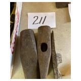 Old ax, heads and sledgehammer head
