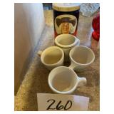 Vintage cups, and tin