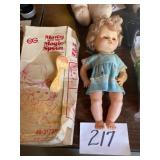 Marcy with her magic spoon doll