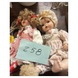 Two ceramic dolls