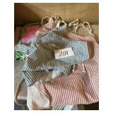 Colorful aprons and table clothes