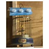 Canary in a cage music box needs repair