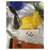 Cumberland advertising pig bank and Wood parrot
