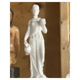Porcelain statue drawing water
