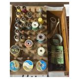 Sewing drawer with thread and needles