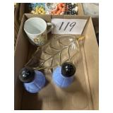 Assorted items cup dish, and salt and pepper