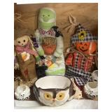 Halloween decorations and dolls and owl dish