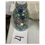 Old jar with marbles