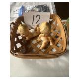 Piano babies in basket