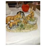 Foxes and rabbit figurine