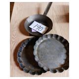 Vintage tin ware 2 pie pans and a skillet