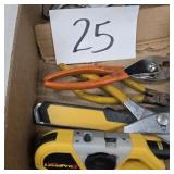 Lot of pliers and laser level