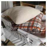 Basket full of pillows -look new