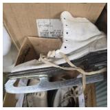 2 pairs of vintage ice skates