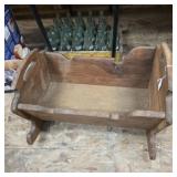 Vintage wooden rocking cradle