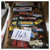 Lot of tractor trailers trucks Mayflower, Pepsi