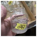 Small glass bottle worth glass tubes inside