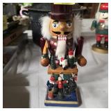 Nutcracker with toys and holiday items