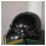 Vintage motorcycle helmet skull half black