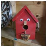 Funny birdhouse with googly eyes