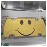 Smiley face license plate with palm trees