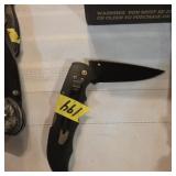 Folding black pocket knife