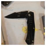 W62 black folding knife