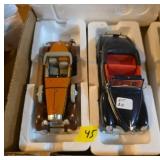 Two Die-Cast Model Cars in Boxes