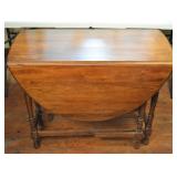 Walnut Drop Leaf  Table Oval in shape when opened