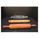 Two Wooden Rolling Pins and One Glass Rolling Pin