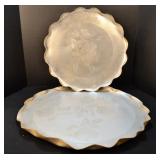 Two large aluminum serving platters