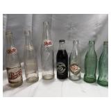 3 Pepsit Bottles and 3 Coca-Cola Bottles