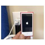 Fuscia Ipod with charger and earbuds