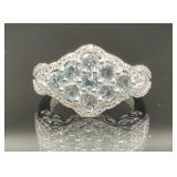 STERLING SILVER RING WITH LIGHT BLUE STONES SIZE 6