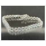 STERLING SILVER BRACELET WITH LIGHT BLUE STONES SI