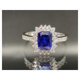 STERLING SILVER RING WITH BLUE AND WHITE STONES SI