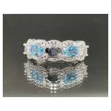 STERLING SILVER RING WITH WHITE LIGHT BLUE, DARK B