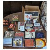 Assorted CDs, Cassette Tapes, and VHS Cassettes