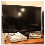 32" Flatscreen  TV, DVD Player & DVDs - works