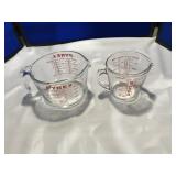 2 Pyrex Measuring Cups