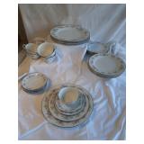 China with Rose Pattern and Silver Edge