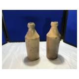 2 Salt Glazed Crock Bottles